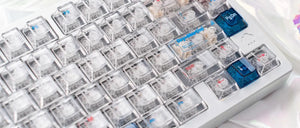 Detailed image of Transparent Galaxy PC Keycaps with backlighting effects