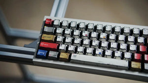Detailed image of Multi Comics Styles keycaps with glossy finish and intricate details