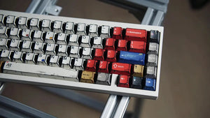 Diverse comic-themed keycaps on a mechanical keyboard enhancing gaming aesthetics